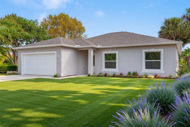 prairie-style home with a garage and a front yard