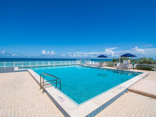 8405 Red Bay Ct Unit 8405, Vero Beach, FL 32963 - pool with a patio area, fence, and a water view