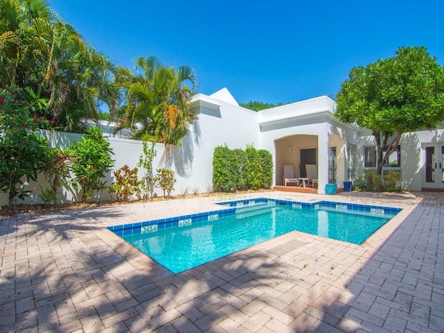 8405 Red Bay Ct Unit 8405, Vero Beach, FL 32963 - view of swimming pool featuring a patio area, french doors, fence, and a fenced in pool