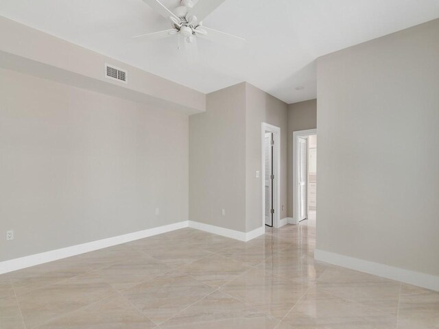 8405 Red Bay Ct Unit 8405, Vero Beach, FL 32963 - empty room with ceiling fan, baseboards, and visible vents