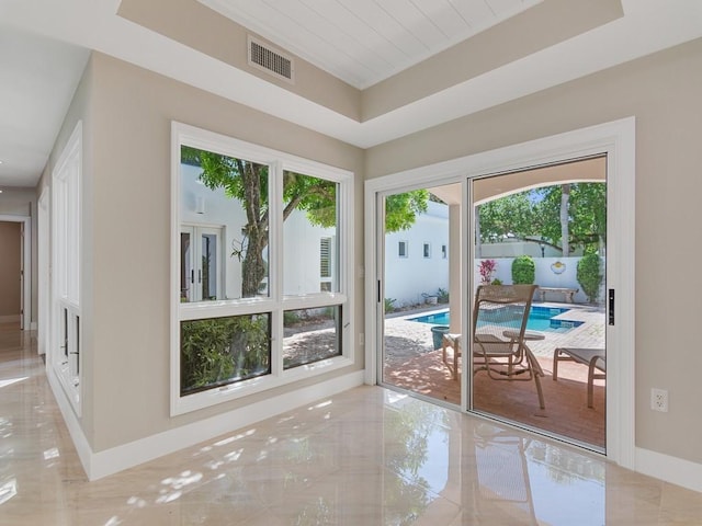 8405 Red Bay Ct Unit 8405, Vero Beach, FL 32963 - entryway featuring marble finish floor, baseboards, visible vents, and plenty of natural light