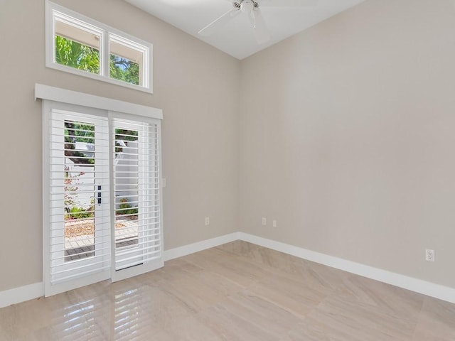 8405 Red Bay Ct Unit 8405, Vero Beach, FL 32963 - spare room featuring ceiling fan and baseboards