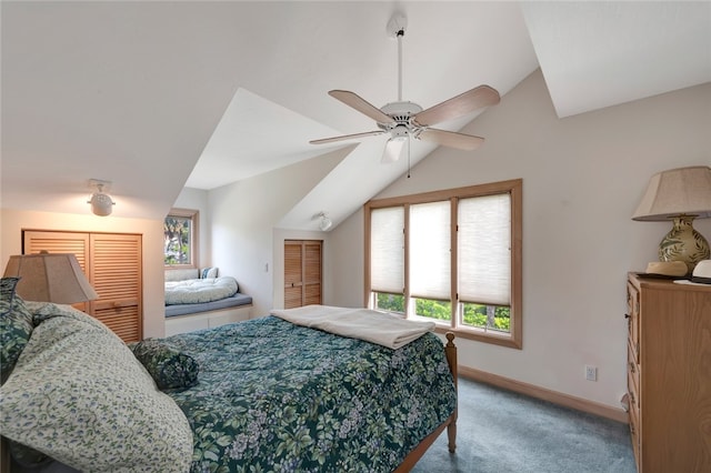 bedroom with carpet flooring, ceiling fan, a closet, and vaulted ceiling