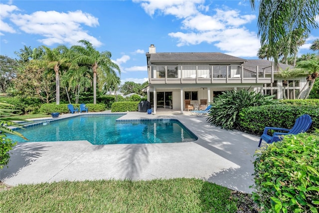 view of pool featuring a patio area