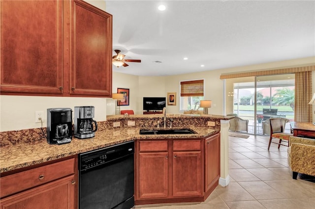 kitchen featuring sink, light stone counters, light tile patterned floors, black dishwasher, and kitchen peninsula