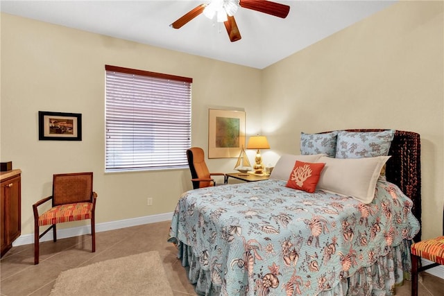 bedroom featuring ceiling fan and light tile patterned floors