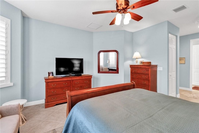 bedroom featuring ceiling fan and light tile patterned flooring