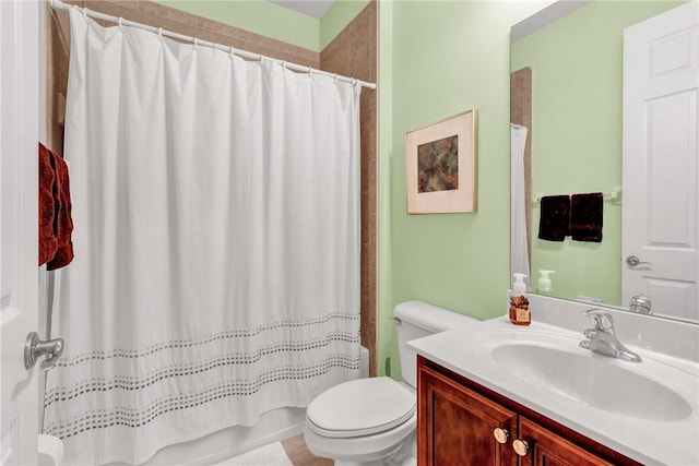 full bathroom with vanity, shower / bathtub combination with curtain, and toilet