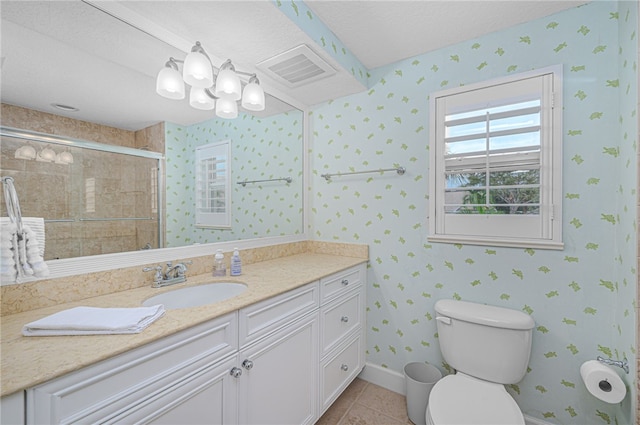 full bathroom with toilet, a stall shower, vanity, and wallpapered walls