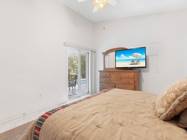 bedroom with ceiling fan and access to outside