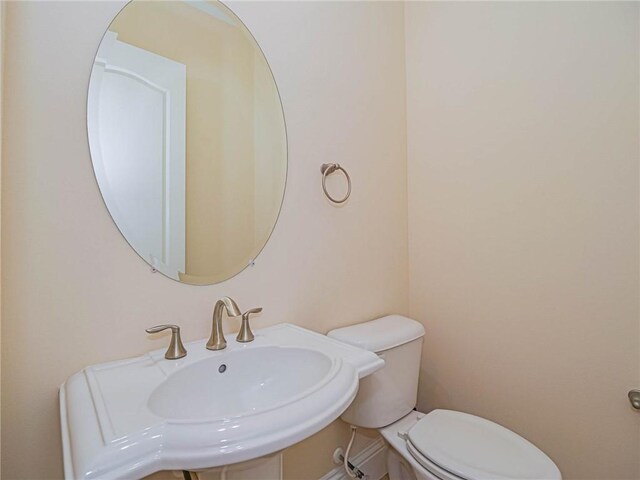 4440 Jacqueline Mnr SW, Vero Beach, FL 32968 - half bath featuring toilet and a sink