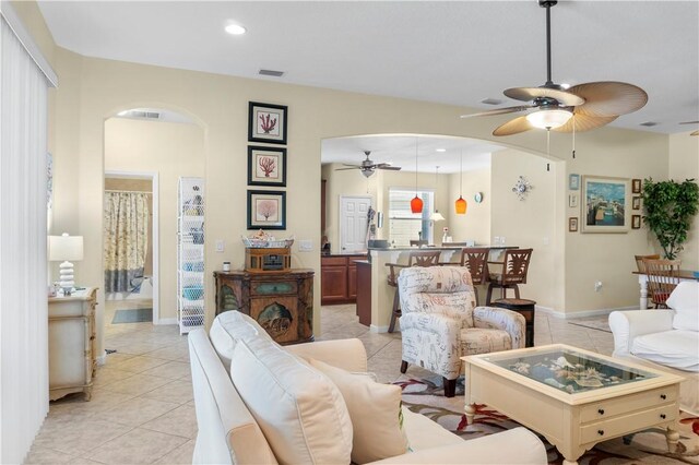 living room with light tile patterned floors