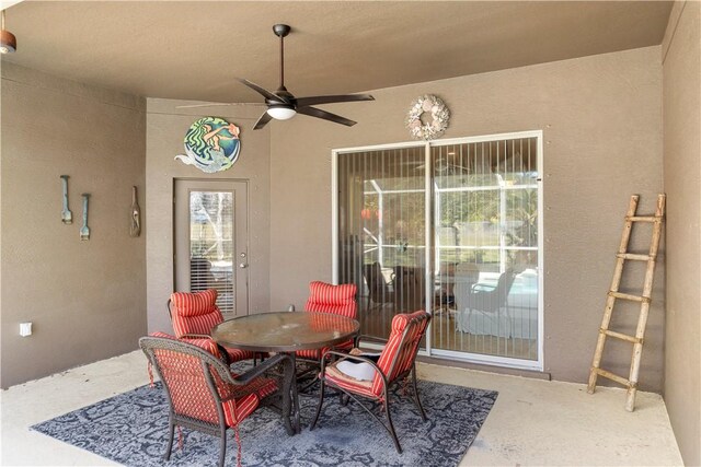 view of patio with ceiling fan