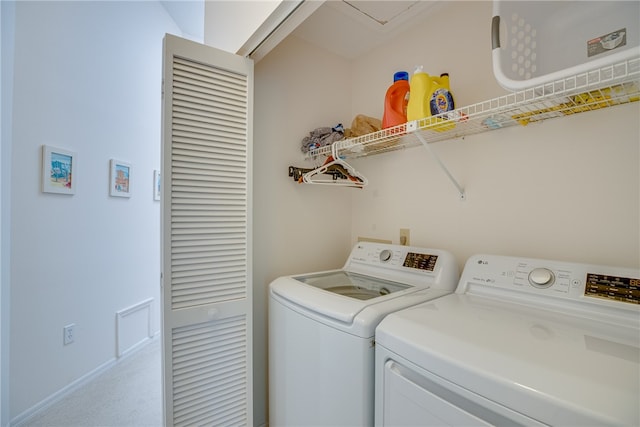 laundry area featuring washer and clothes dryer