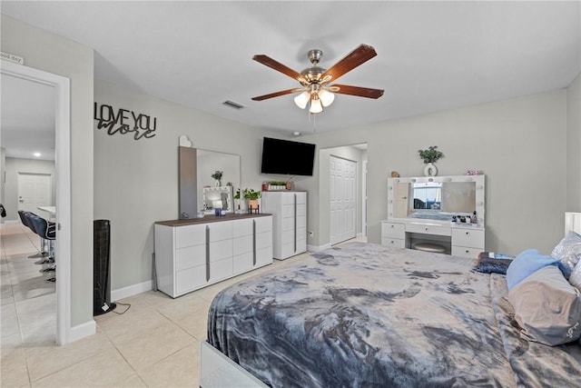 bedroom with light tile patterned floors and ceiling fan