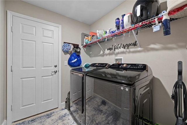 laundry area featuring washing machine and dryer