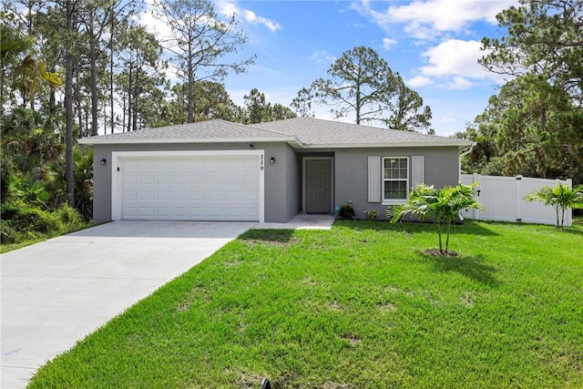 ranch-style home featuring a front lawn and a garage