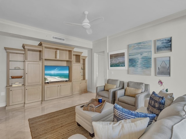 living room with ceiling fan and crown molding