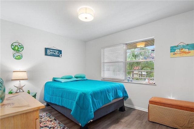 bedroom featuring dark hardwood / wood-style floors