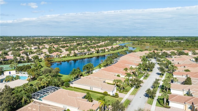 drone / aerial view with a water view