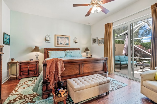 bedroom with dark hardwood / wood-style floors, ceiling fan, and access to exterior