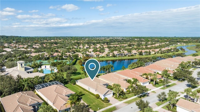 drone / aerial view featuring a water view