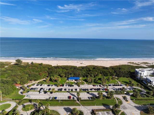 bird's eye view with a beach view and a water view