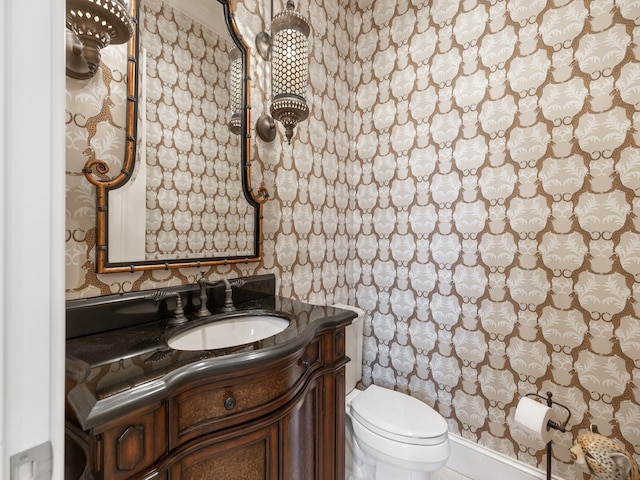 bathroom with vanity and toilet