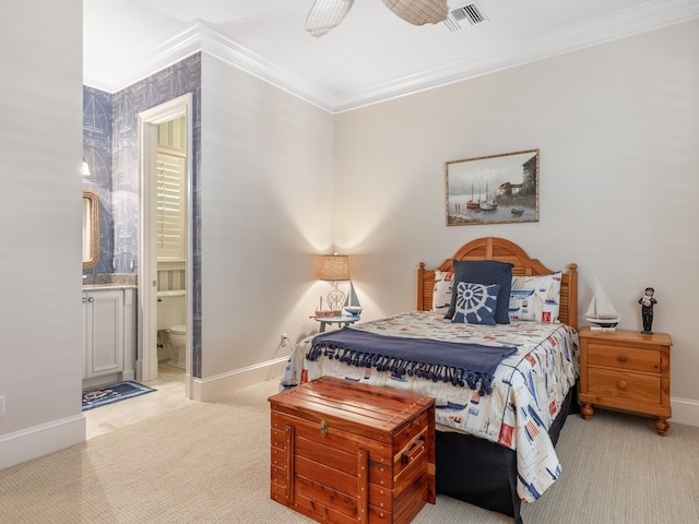 bedroom with ornamental molding, light carpet, ceiling fan, and ensuite bath