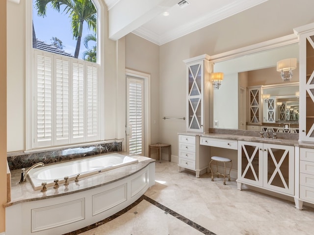 bathroom featuring vanity, plenty of natural light, a bathtub, and crown molding