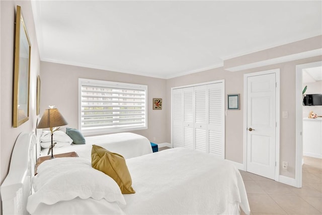 bedroom featuring light tile patterned floors and ornamental molding