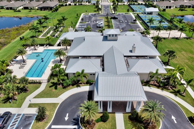 birds eye view of property featuring a water view