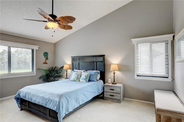 5725 Pelican Pointe Dr Unit 4, Sebastian, FL 32958 - bedroom with lofted ceiling, carpet flooring, baseboards, and ceiling fan