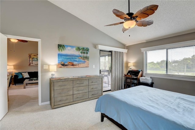5725 Pelican Pointe Dr Unit 4, Sebastian, FL 32958 - bedroom with access to exterior, light colored carpet, vaulted ceiling, a ceiling fan, and a textured ceiling