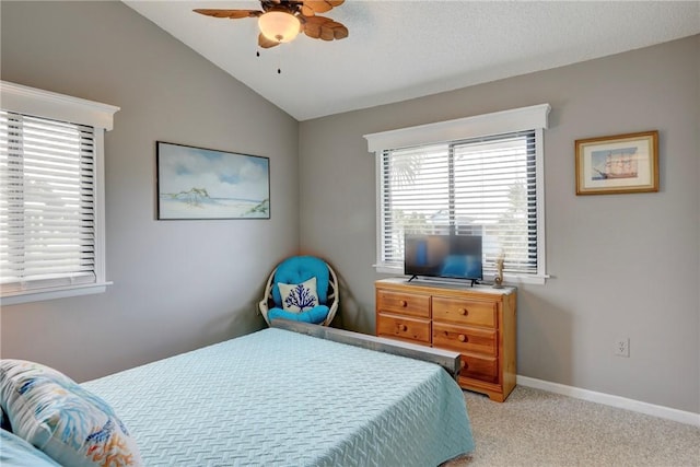 5725 Pelican Pointe Dr Unit 4, Sebastian, FL 32958 - bedroom with light colored carpet, lofted ceiling, baseboards, and a ceiling fan