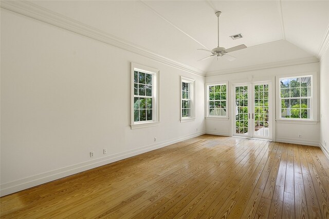 interior space with lofted ceiling and ceiling fan