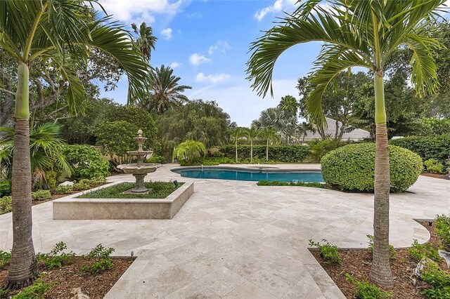 201 Sundial Ct, Vero Beach, FL 32963 - outdoor pool featuring a patio area