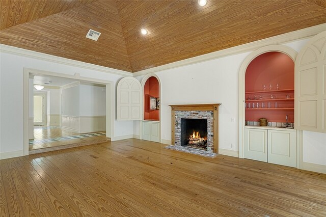 unfurnished living room with built in features, wood-type flooring, high vaulted ceiling, sink, and wooden ceiling