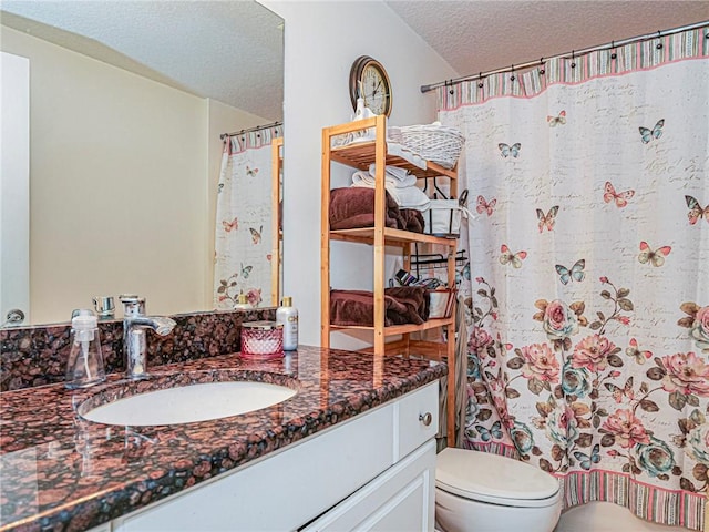 5095 Fairways Cir Unit I203, Vero Beach, FL 32967 - bathroom with vanity, a textured ceiling, and curtained shower