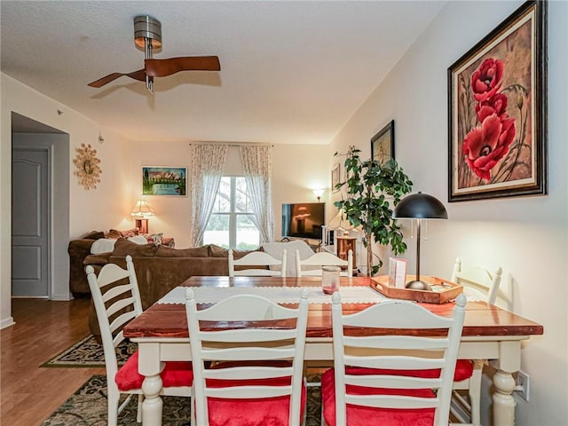 5095 Fairways Cir Unit I203, Vero Beach, FL 32967 - dining room featuring a ceiling fan and wood finished floors