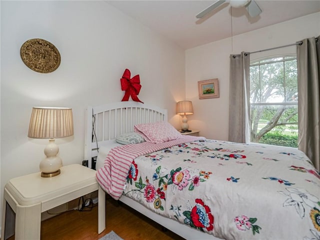 5095 Fairways Cir Unit I203, Vero Beach, FL 32967 - bedroom featuring wood finished floors, multiple windows, and ceiling fan