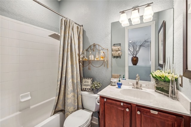 full bathroom featuring toilet, vanity, and shower / bath combination with curtain