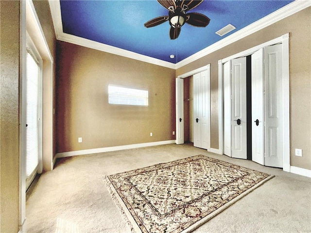 bedroom with french doors, carpet flooring, ornamental molding, and access to exterior