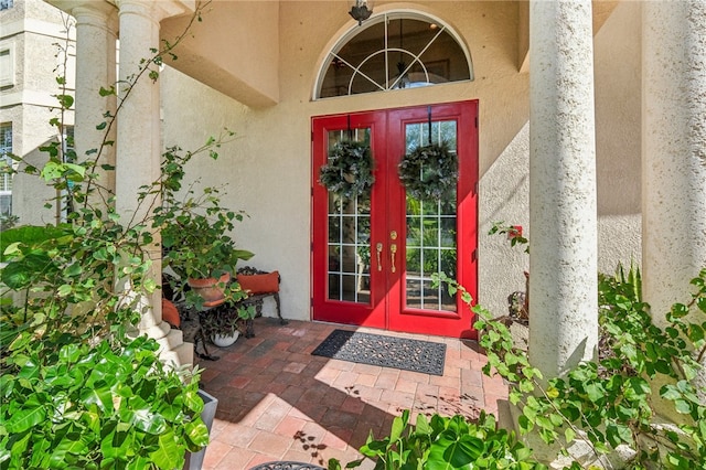 entrance to property featuring french doors