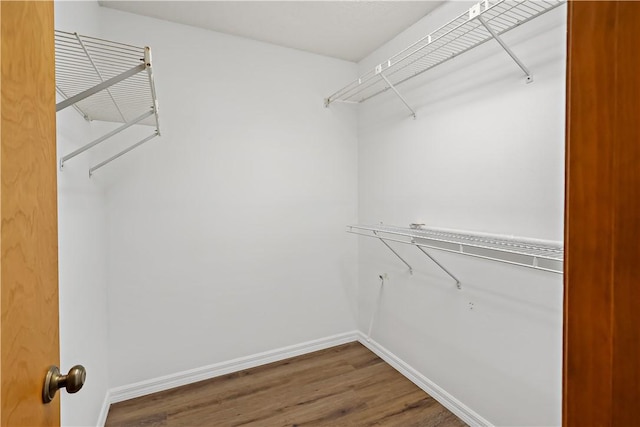 930 47th Ave SW, Vero Beach, FL 32968 - spacious closet featuring wood finished floors