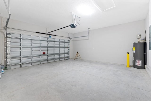 garage featuring a garage door opener and water heater