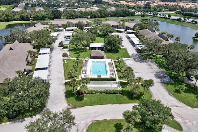 bird's eye view with a water view and a residential view