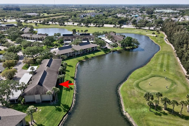bird's eye view featuring a water view, golf course view, and a residential view