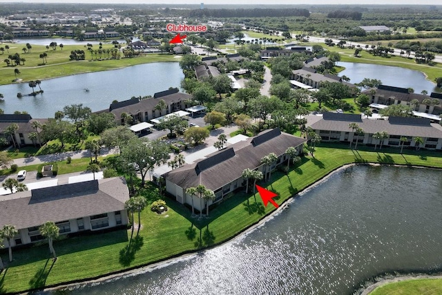 aerial view featuring a residential view and a water view