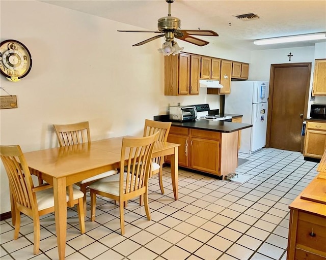 kitchen with stainless steel range with electric stovetop, ceiling fan, white refrigerator, and light tile patterned floors